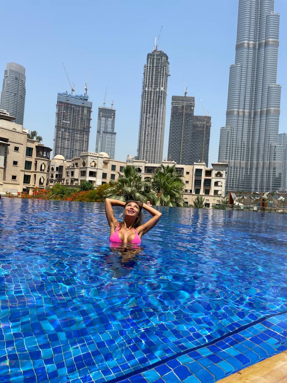 Hot Monika Fox In Pink Bikini By Pool Against Background Of Skyscrapers