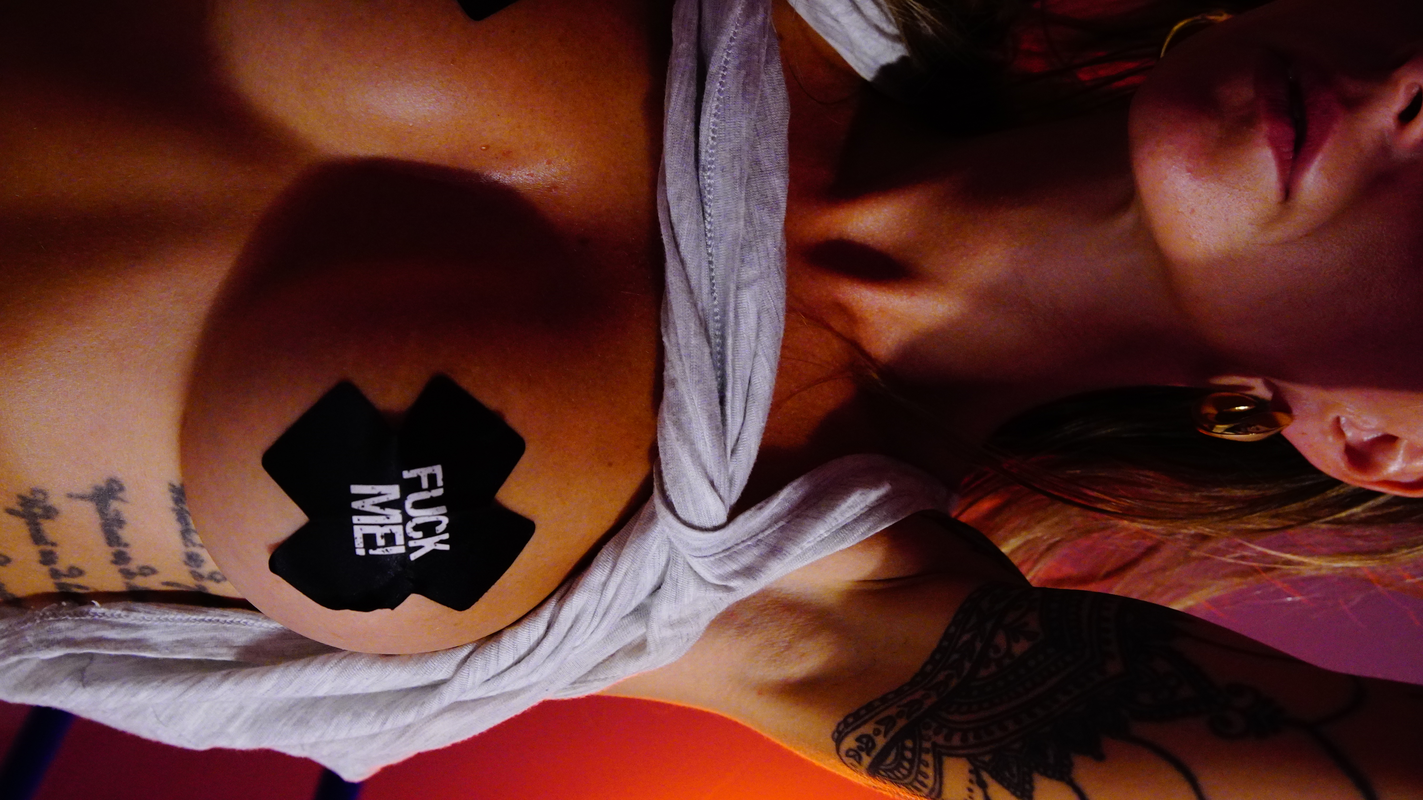 Explicit Tattooed Model Session: Moody Neon Lingerie Close-Ups